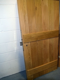 oak-security-door-sloping-top-rear